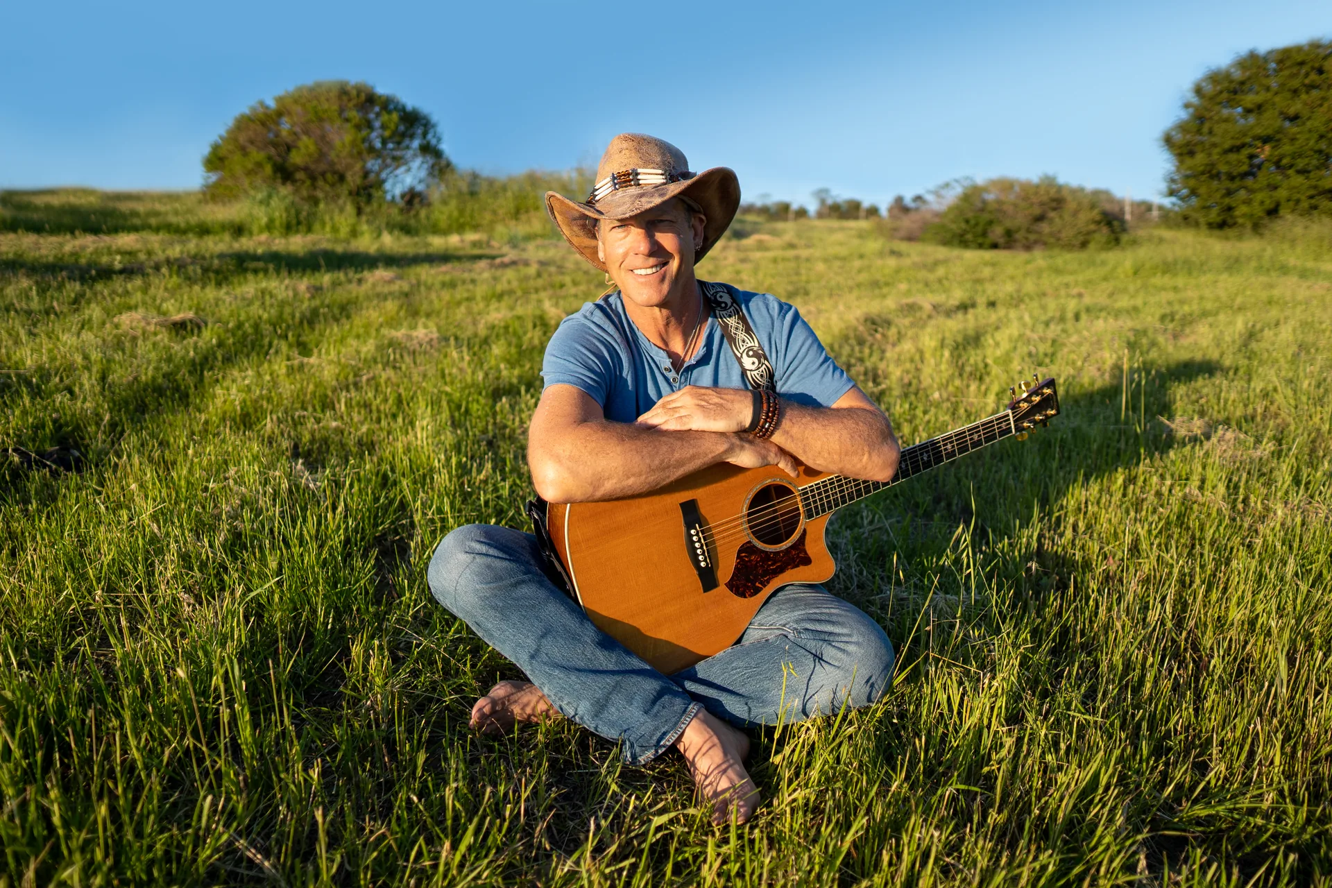 Outdoor musician portrait photographed in golden afternoon light